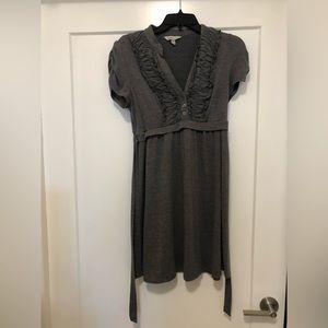 Dark grey dress with ruffle front and tie in the back